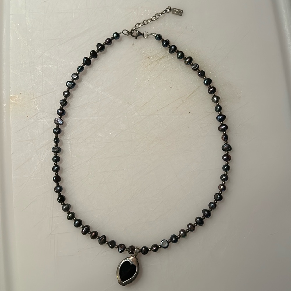 Peyote bird - purple/black opal necklace w/ black pendon.